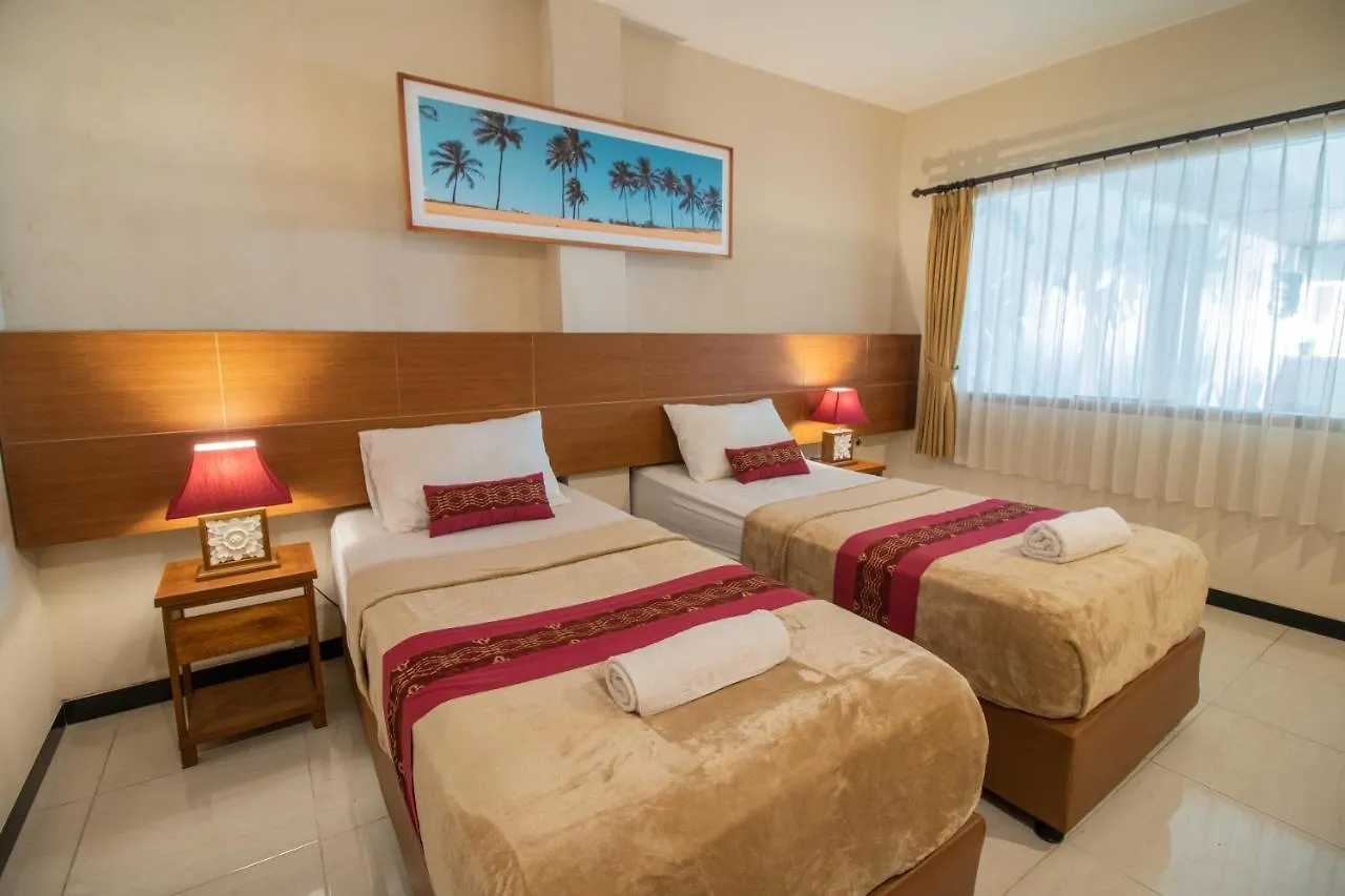 Kuta Suci Guesthouse Отель Кута